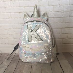 flip sequin backpack with initial